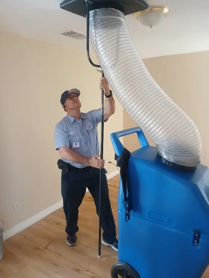 HVAC Installation technician using HEPA equipment in Travilah